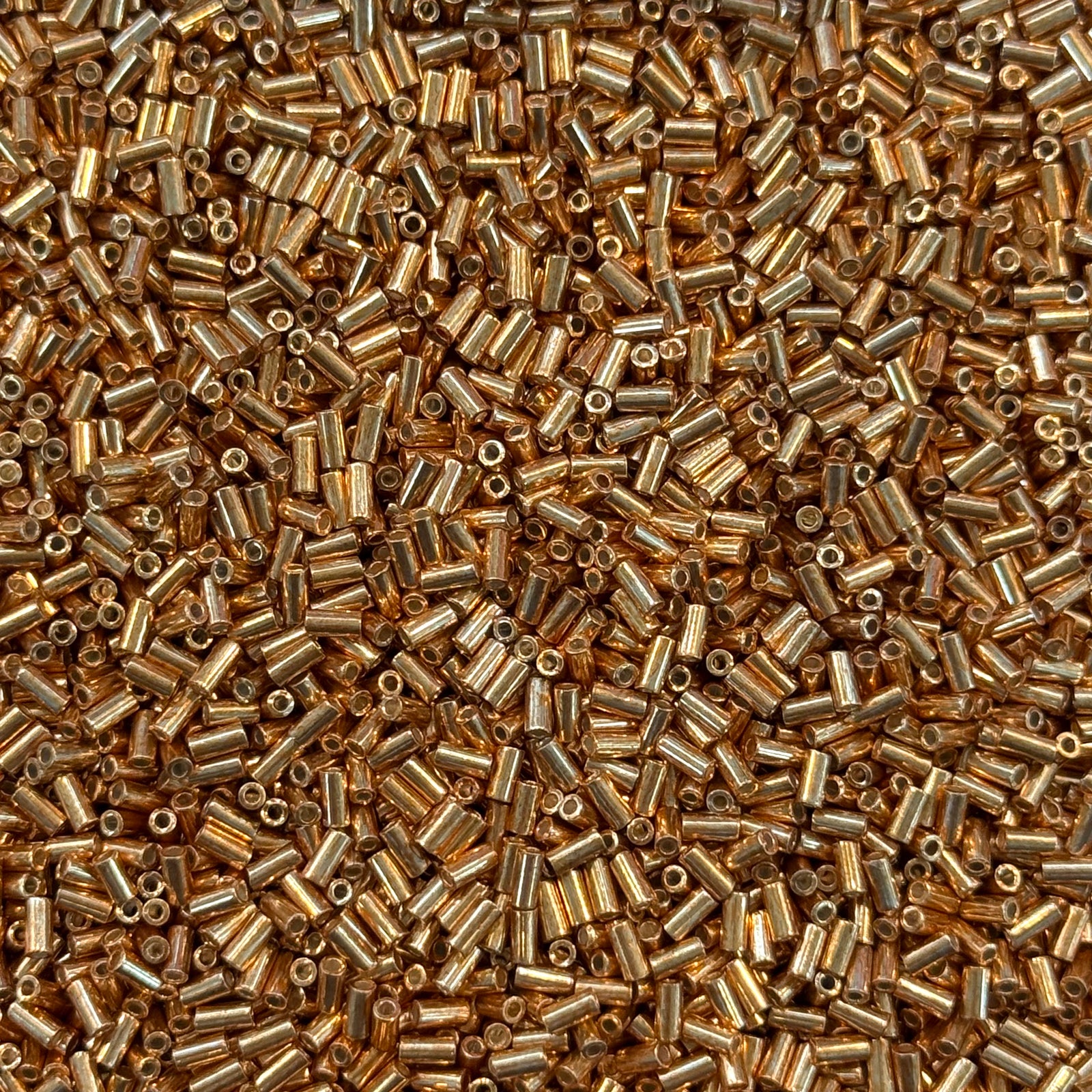 Miyuki Bugles size 3mm 1053 Galvanized Yellow Gold 10 grams.