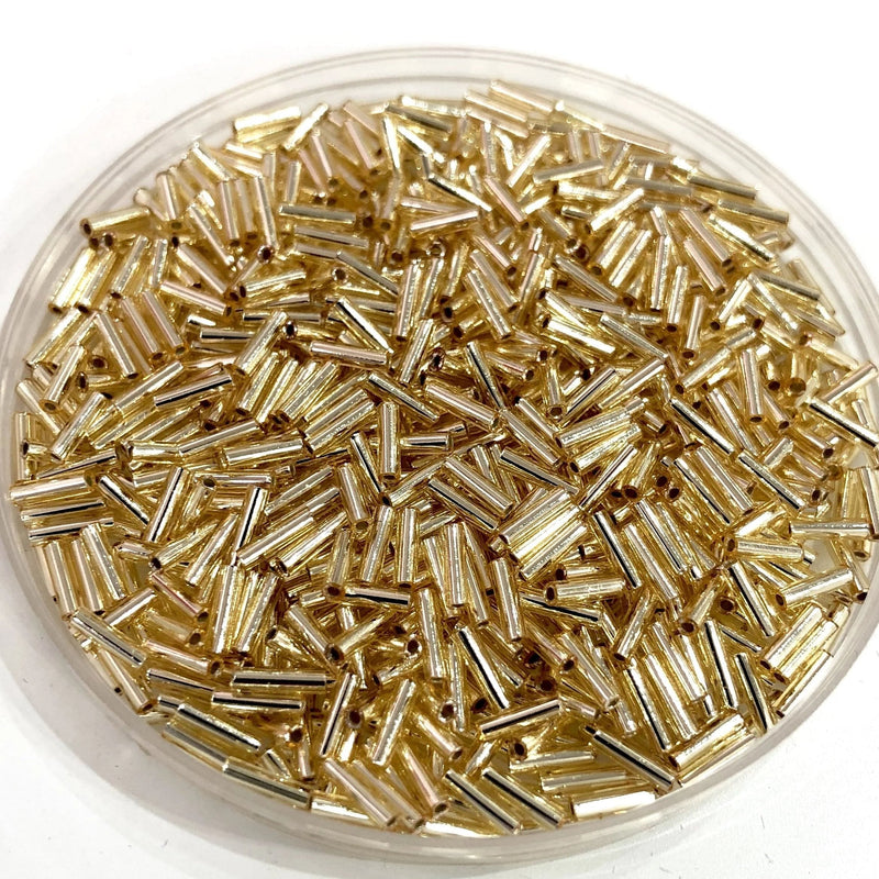 Miyuki Bugles size 6mm 0003 Gold Silver Lined 10 grams.