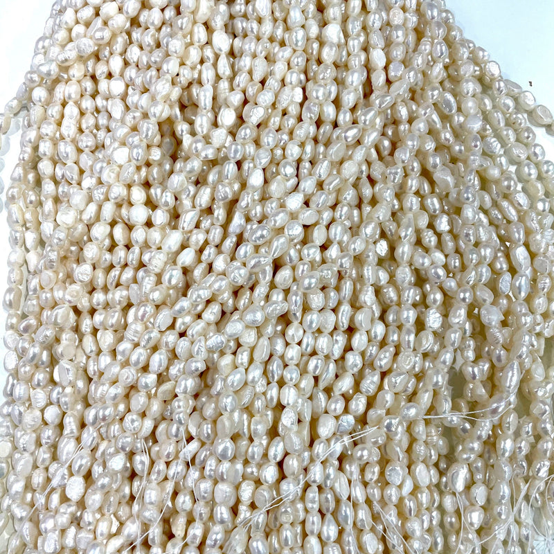 Ivory White Baroque Oval Loose Freshwater Pearls 6x7mm