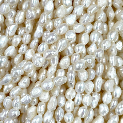 Ivory White Baroque Oval Loose Freshwater Pearls 6x7mm