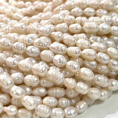 Perles d'eau douce en vrac baroques ovales blanc ivoire 7x8mm