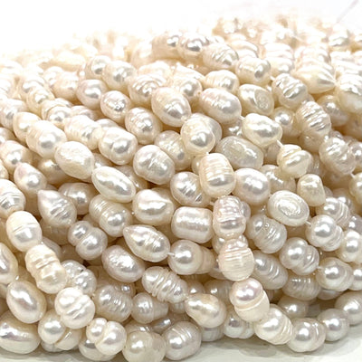 Perles d'eau douce en vrac baroques ovales blanc ivoire 7x8mm