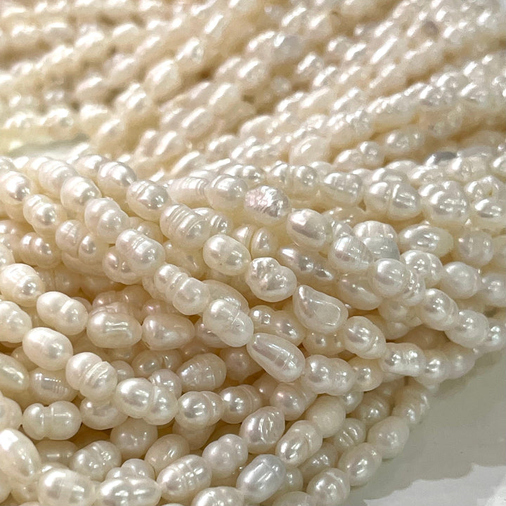 Ivory White Baroque Oval Loose Freshwater Pearls 4.5x5.5mm