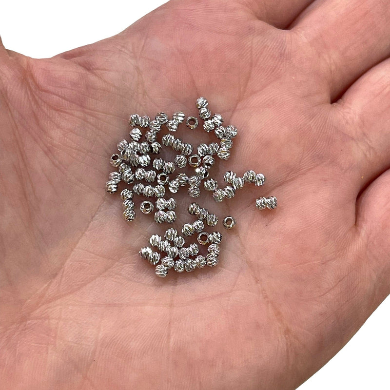 Rhodinierte, lasergeschnittene 2-mm-Abstandsperlen, Rhodinierte 2-mm-Dorica-Abstandsperlen, 50 Perlen in einer Packung
